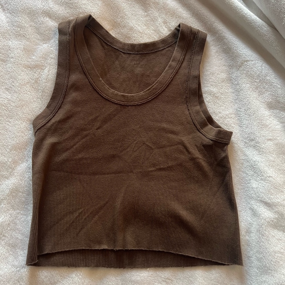 Brown tank top from brandy Melville. Worn a few times but no flaws.